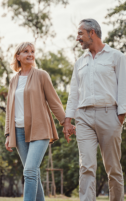 senior couple holding hands on a walk annuities 4l financial llc illinois