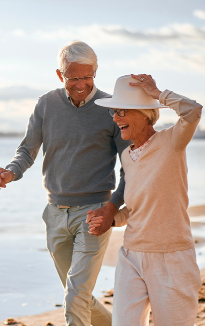 smiling seniors walking beach three core principles 4l financial llc illinois